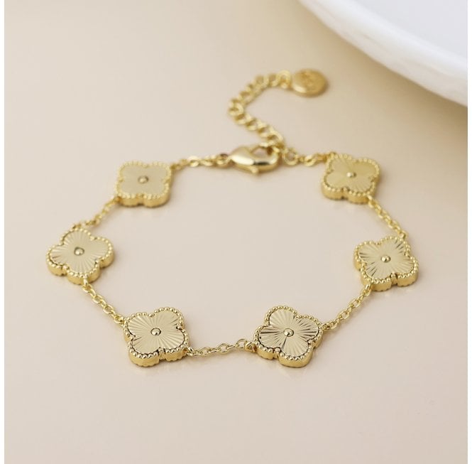 POM FAUX GOLD QUATREFOIL STATION BRACELET